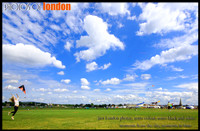 female releases a kite on Blackheath