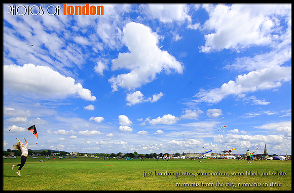 female releases a kite on Blackheath